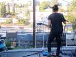 Local Natives perform on the rooftop of their Silver Lake practice space, July 7, 2016. Photo by Bronson