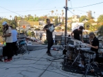 Local Natives perform on the rooftop of their Silver Lake practice space, July 7, 2016. Photo by Bronson