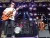 INDIO, CA - APRIL 17: (L-R) Musicians Jim Heath, drummer Scott Churilla and bass player Jimbo Wallace of The Reverand Horton Heat perform onstage during the 2015 Coachella Music Festival at The Empire Polo Club on April 17, 2015 in Indio, California. (Photo by Scott Dudelson/FilmMagic) *** Local Caption *** Jim Heath, Scott Churilla;Jimbo Wallace