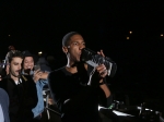 Jon Batiste leads his band through the crowd at the Playboy Jazz Festival 2016 at the Hollywood Bowl. Photo by Mathew Imaging